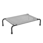 Simple Trending raised dog bed with a small dog resting on the elevated surface for cooling comfort.