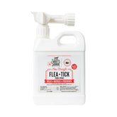 Skout's Honor flea tick yard spray bottle with hose-end applicator for convenient outdoor pest control.