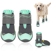 SlowTon dog shoes in green waterproof fabric protect paws from rain.