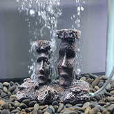 Smoothedo-Pets grey moai air stone decor enhances underwater scenery.