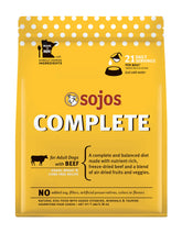 Sojos Complete Beef packaging highlights grain-free formula for convenient, mess-free meals.