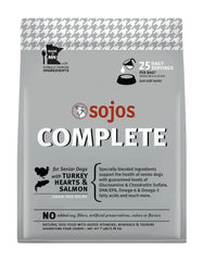 Sojos Complete turkey-salmon dog-food-bag shows dehydrated mix ready for quick rehydration