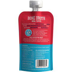 Solid Gold beef bone broth used to hydrate a dog's meal with rich aroma.