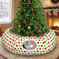Soulchen cat tunnel Christmas tree skirt setup provides a playful, tree-protecting refuge for kittens.