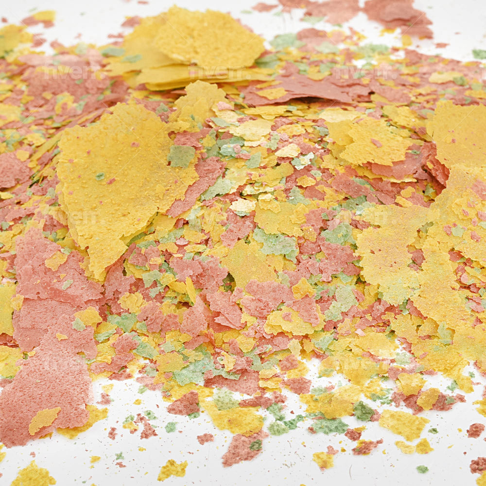 South Shore Retail color-enhancing tropical fish food flakes bottle pour promotes vibrant colors.