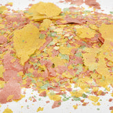 South Shore Retail color-enhancing tropical fish food flakes bottle pour promotes vibrant colors.