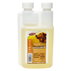 Southern Ag Flea Tick and Mange Dip bottle pour for easy at-home pet treatment