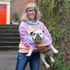 Spark Paws Human Hoodie cotton candy raglan sleeves emphasizing relaxed fit and comfort.