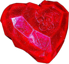 Spunky Pup Squeaky Gems Heart toy floats for beachside play and retrieval.