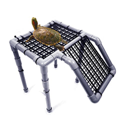 StellarOcean turtle basking platform inside tank offers secure rest for aquatic turtles.