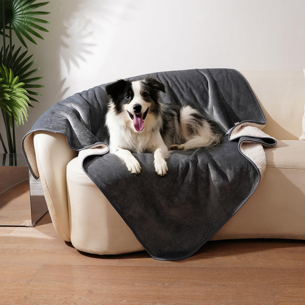 Sunheir waterproof dog blanket with soft sherpa surface provides cozy warmth on furniture