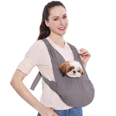Supet dog sling carrier dual-strap setup for balanced weight and shoulder comfort.