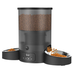 Surdy automatic feeder with two bowls enables calm meals for two cats.