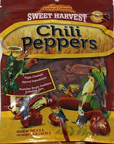 Sweet Harvest chili peppers treat bag close-up showing vitamin-enriched snacks for birds.