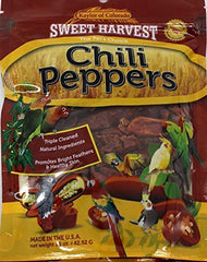 Sweet Harvest chili peppers treat bag close-up showing vitamin-enriched snacks for birds.