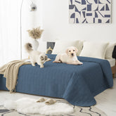 Tcksstex waterproof bed cover in navy protects furniture from spills and accidents.