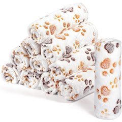 Tegeme paw-print blanket close-up highlighting warm, comfy naps for small pets.