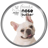 The Blissful Dog Nose Butter tin close-up shows unscented formula for dry noses.