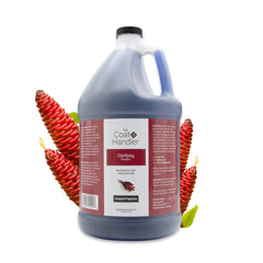 The Coat Handler Clarifying Dog Shampoo bottle front shows a professional-grade product for bright, clean coats.