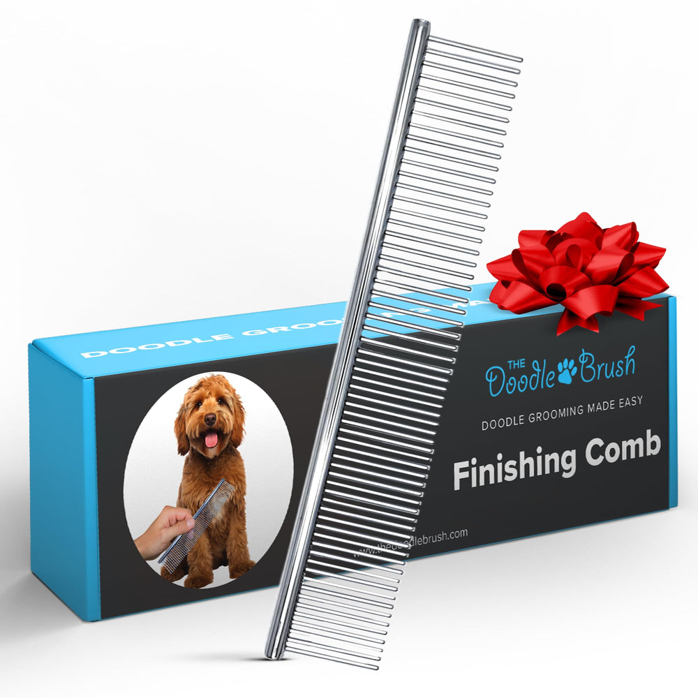 The Doodle Brush steel teeth dog comb gliding through mats for a smoother coat