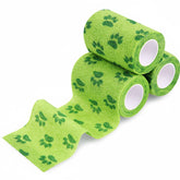 Threlaco no-chew dog bandage in green wrap protects wounds during daily activity.