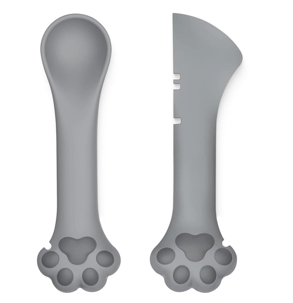 TidyNuts cat food spoon angled in grey for easy scooping of leftovers.