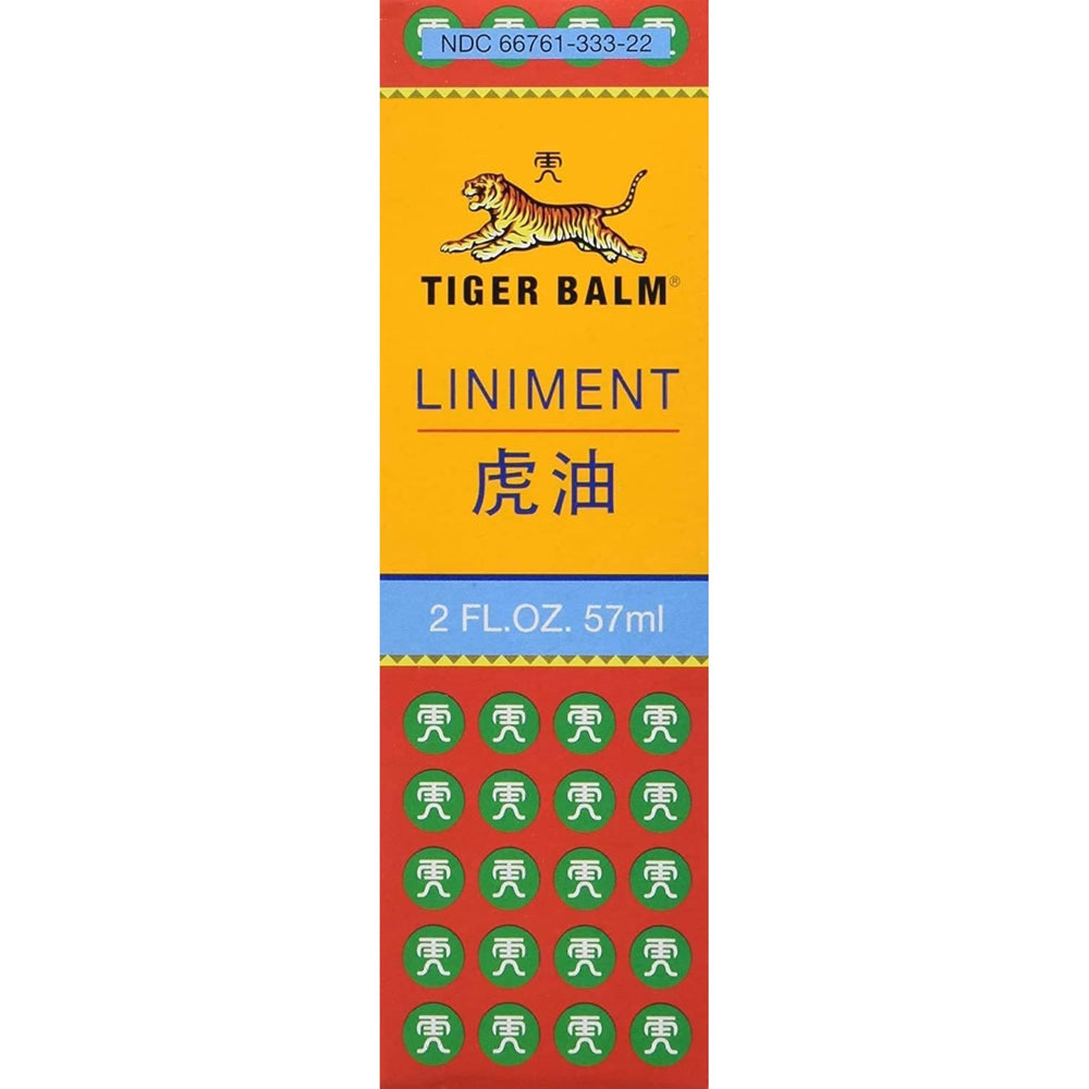 Tiger Balm Liniment bottle closeup highlighting rich topical formula for targeted relief.