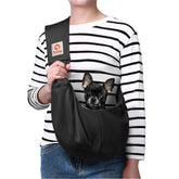 Tomkas dog sling carrier front view shows compact portability for small dogs on-the-go
