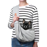 TOMKAS dog sling gray front view, easy access for small dogs during outings.