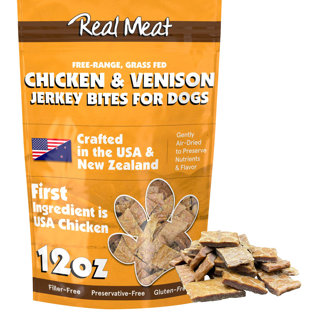 TRMC Real Meat Dog Treats pack open showing premium venison and chicken jerky for rewarding training.