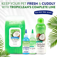 TropiClean dog ear cleaner drops pour demonstrates gentle application for clean ears.
