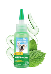 TropiClean oral care brushing gel bottle close-up showing minty formula for pets.