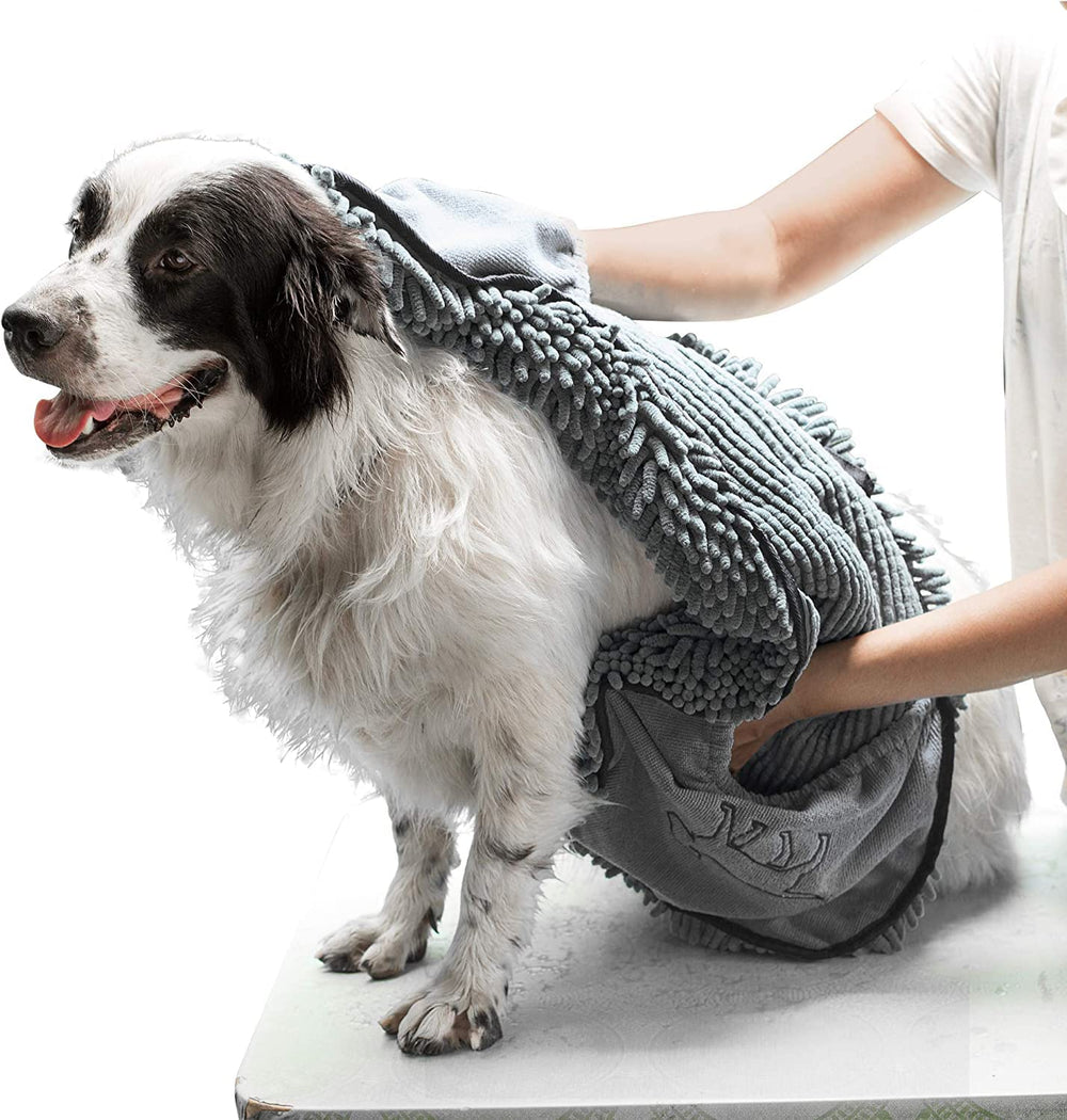 Tuff Pupper Quick Dry Towel demonstrates ultra-absorbent microfiber for fast dog drying.