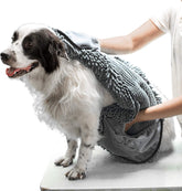 Tuff Pupper Quick Dry Towel demonstrates ultra-absorbent microfiber for fast dog drying.