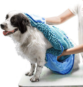 Tuff Pupper Quick Dry Towel dries a dog's paw for quick cleanup after muddy play.