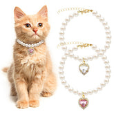Tyqour pink heart collar detail highlighting delicate rhinestones for festive pets.