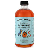 Uncle Dunkels spicy hot pepper deterrent bottle ready to apply to bird seed