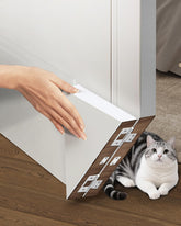 Unik Gryte cat door corner demonstrates universal left-right hinge compatibility for flexible installation.