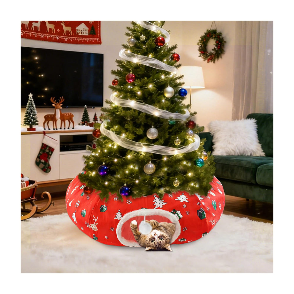 Uoiispet cat tunnel bed under Christmas tree skirt offers cozy holiday hideaway.