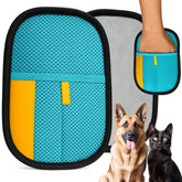 Uproot Clean pet hair glove in use removes fur from sofa fabric.