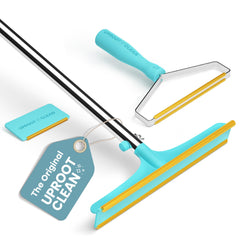 Uproot Cleaner Pro pet hair remover on couch for quick fur cleanup.