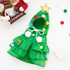 Vellibring cape with colorful pompoms adds playful texture for holiday moments.