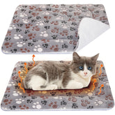 VitalCozy self-warming cat mat on crate keeps pets warm without electricity.