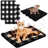VitalCozy self-warming cat pad on plaid surface provides cozy warmth for indoor cats.