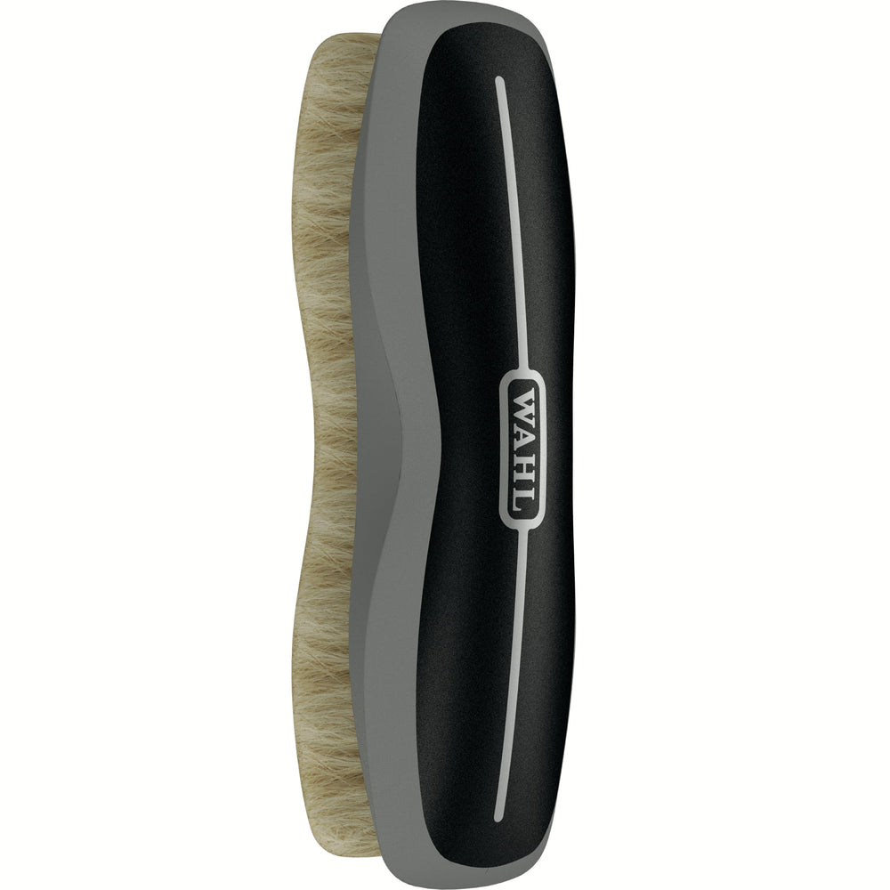 WAHL Soft Body Horse Brush in hand removes loose hair during grooming sessions