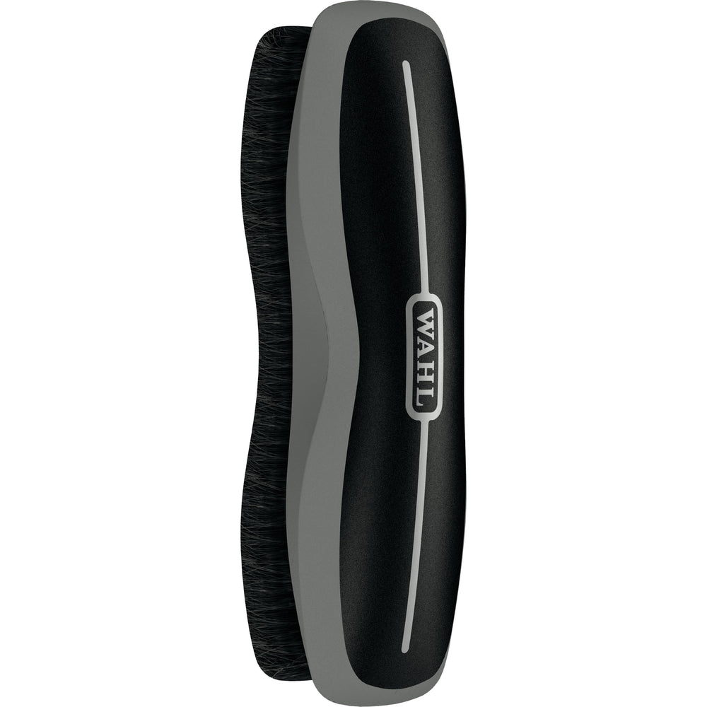 Wahl Stiff Body Horse Brush removes mud for a cleaner coat during daily grooming.