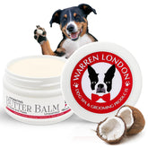 Warren London Hydrating Butter Balm applied to a dog's paw for deep moisture after walks.