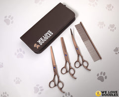 We Love Doodles curved scissor close-up for contour shaping around ears and face.
