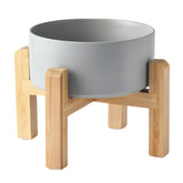 Welloyed 6-inch ceramic raised dog bowl front view highlighting elevated feeding posture.