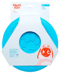 West Paw Zogoflex Zisc aqua blue disk in flight for dog fetch and training.